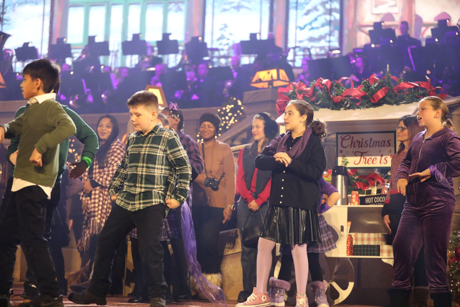 Performers on the Christmas village set