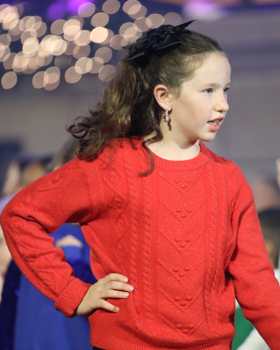 A young performer from the kids worship choir