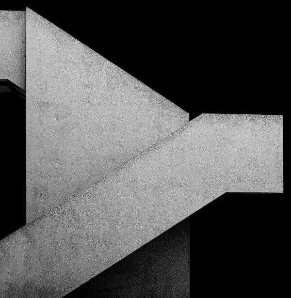 Photo of a modern building with brutalist architecture for JUMPSUIT Agency's website