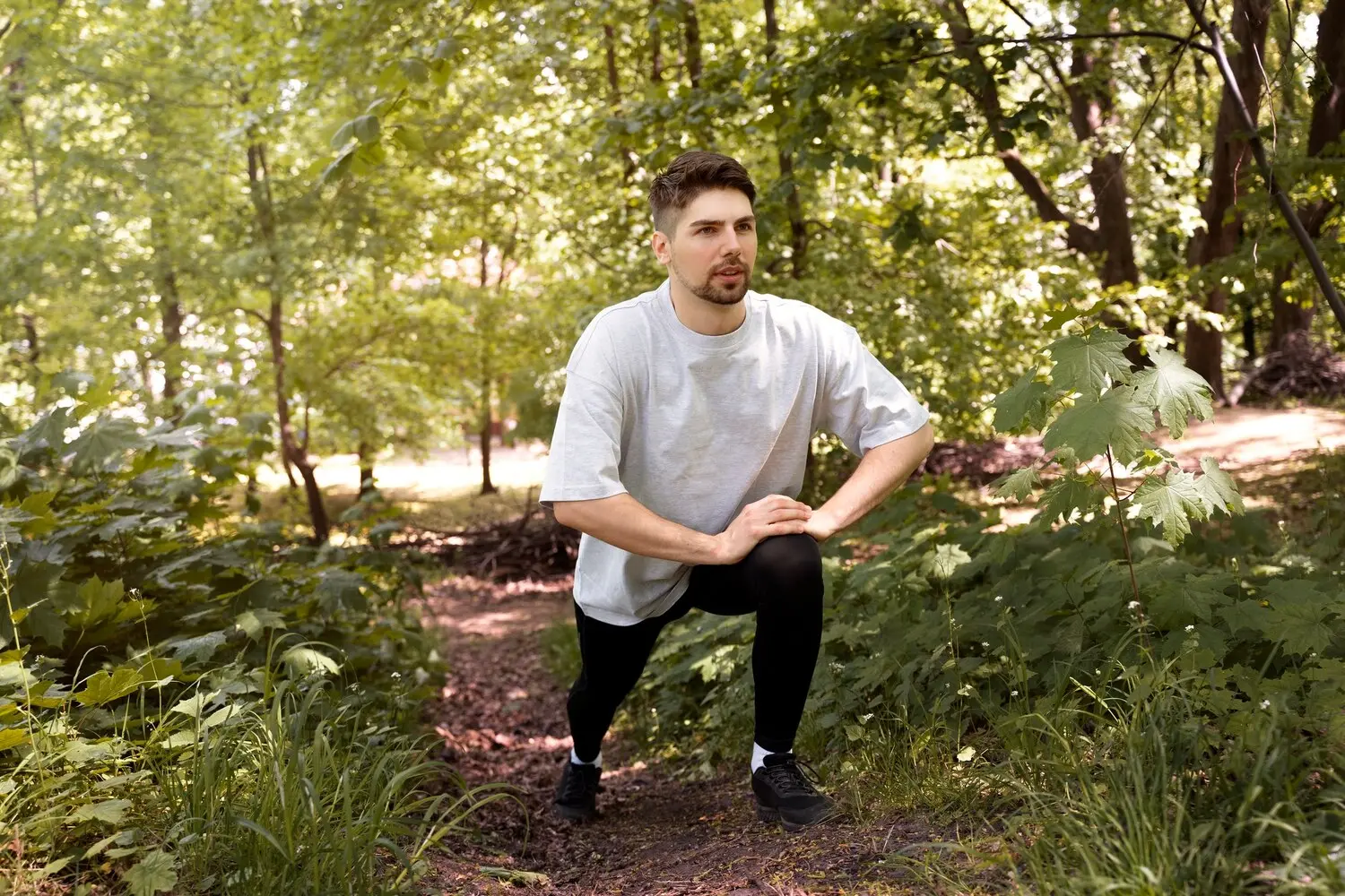 Man exercising on a nature trail and discovering healthy ways to enjoy recovery