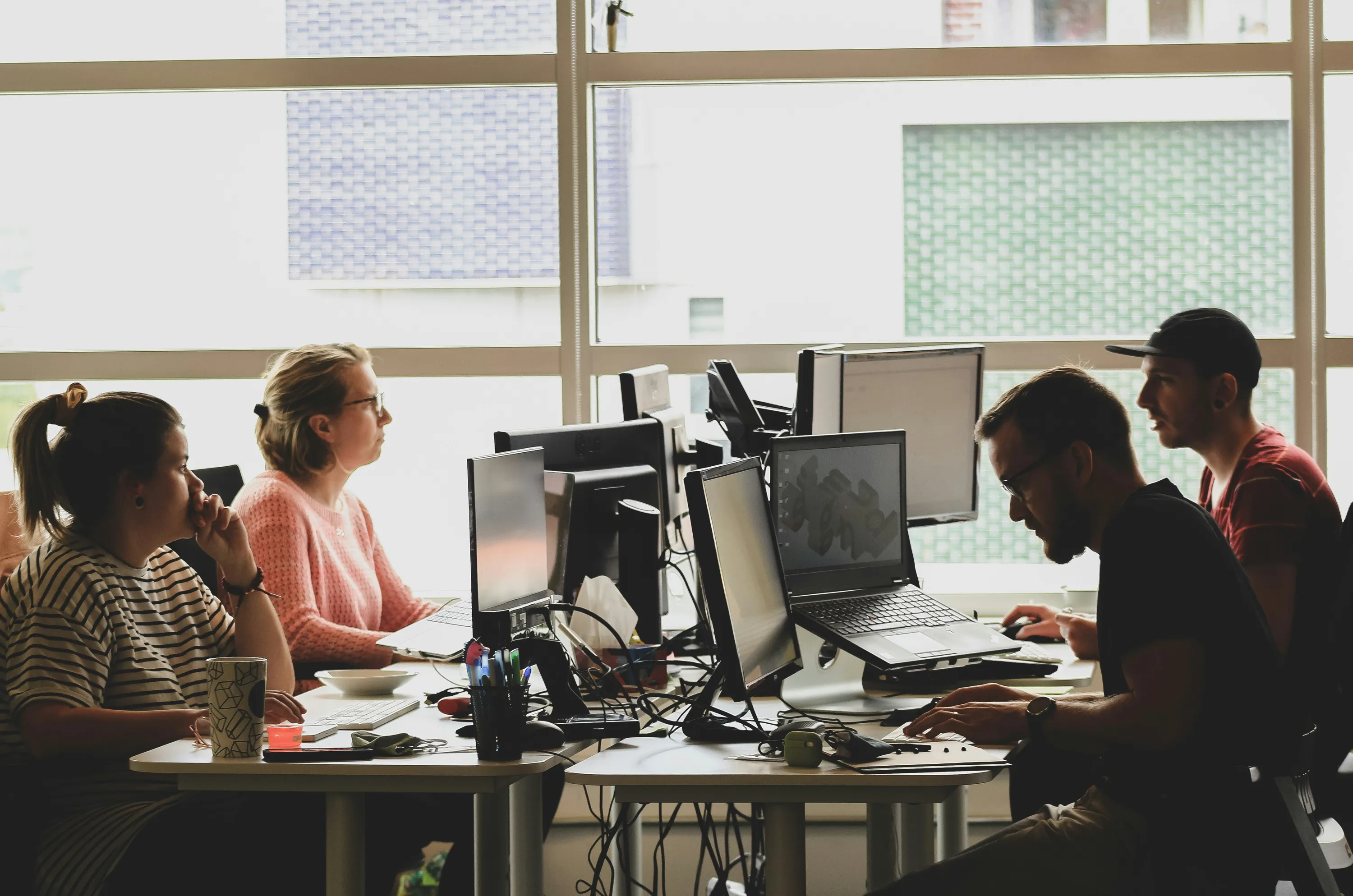 Image of people at work in an office