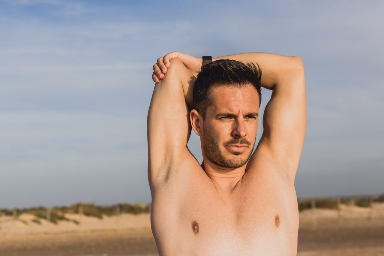 Man showing armpit , casual style and body art close-up