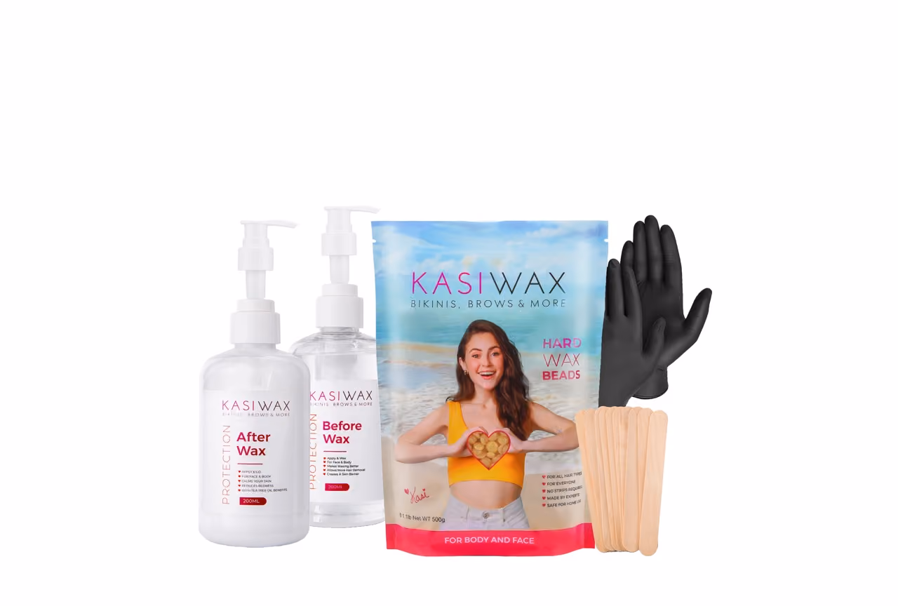 The KASIWAX home waxing kit including creams gloves, beads and wooden sticks