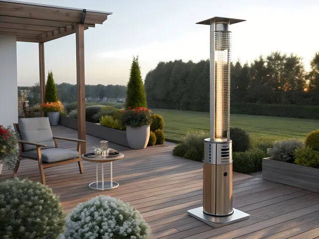 Cozy outdoor patio with modern heater, wooden deck, and scenic garden view