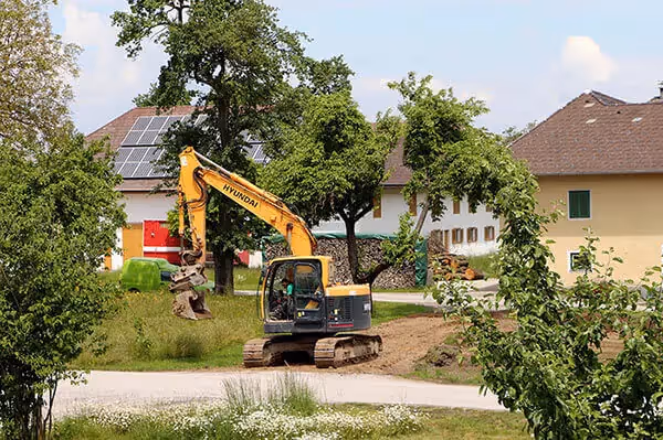 excavators digging up the ground