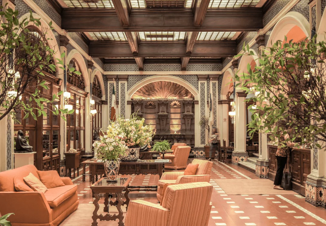 pleasant scent, sophisticated scent equipment, pleasantly scented hotel lobby, warm ambient scents people, sensory cues