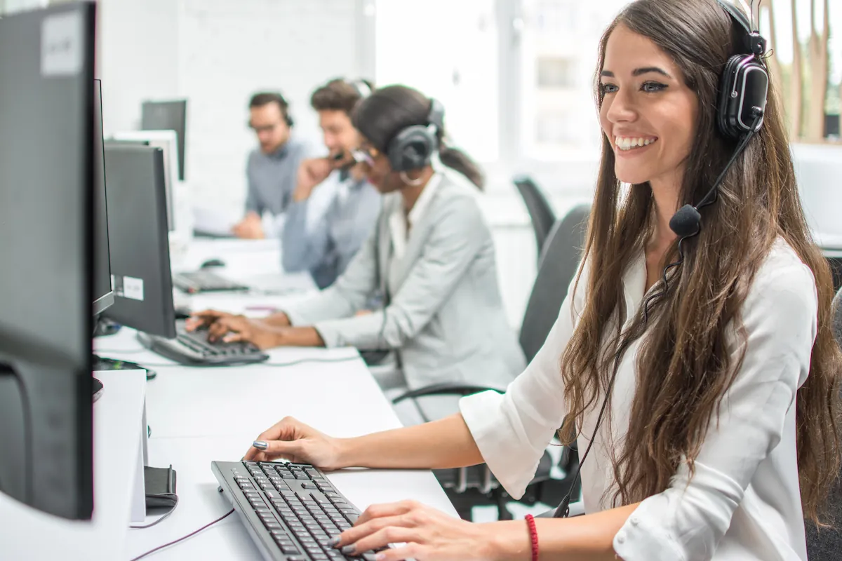 Receptionist looking to a monitor