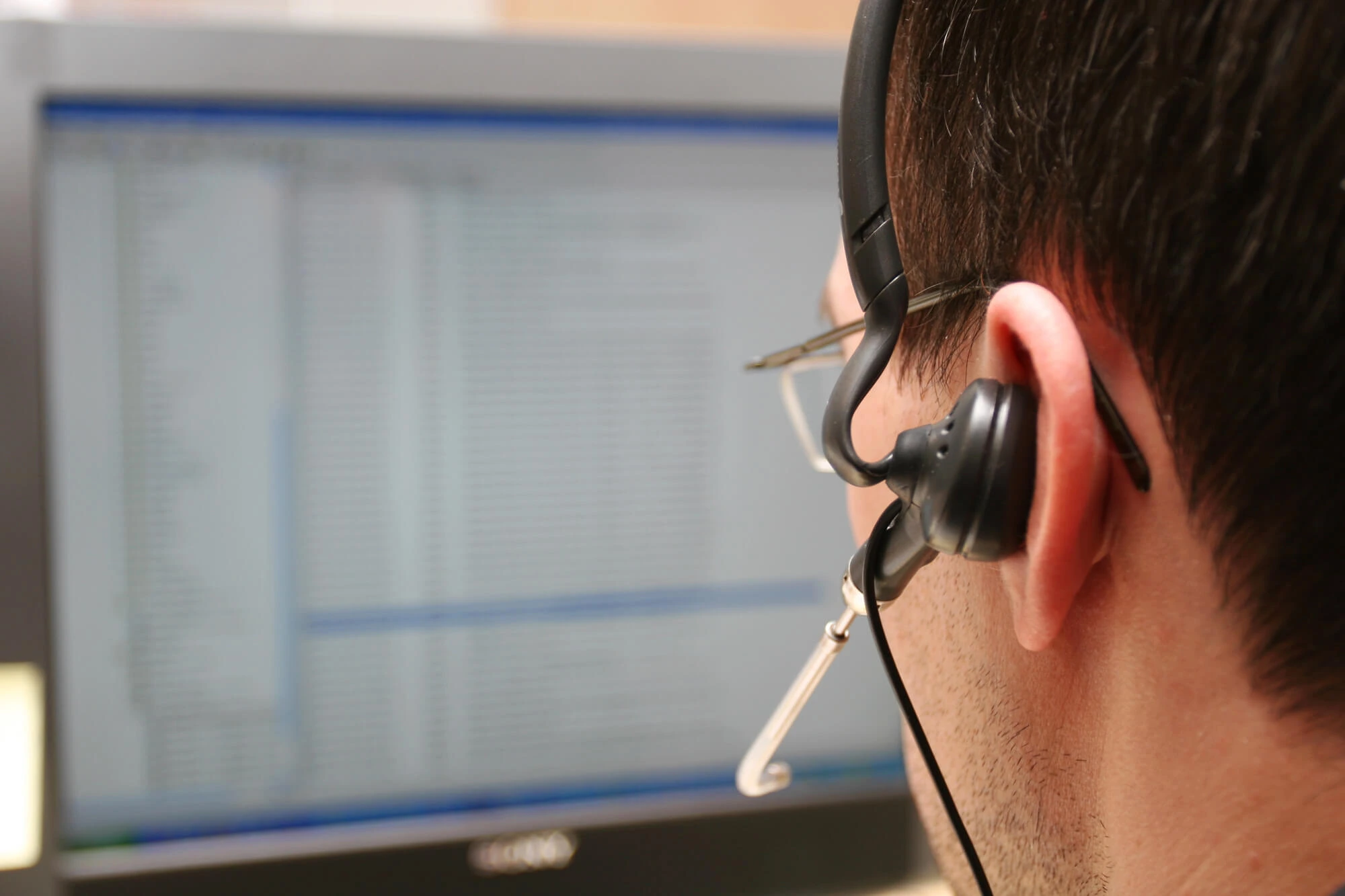 man providing 24-7 answering services