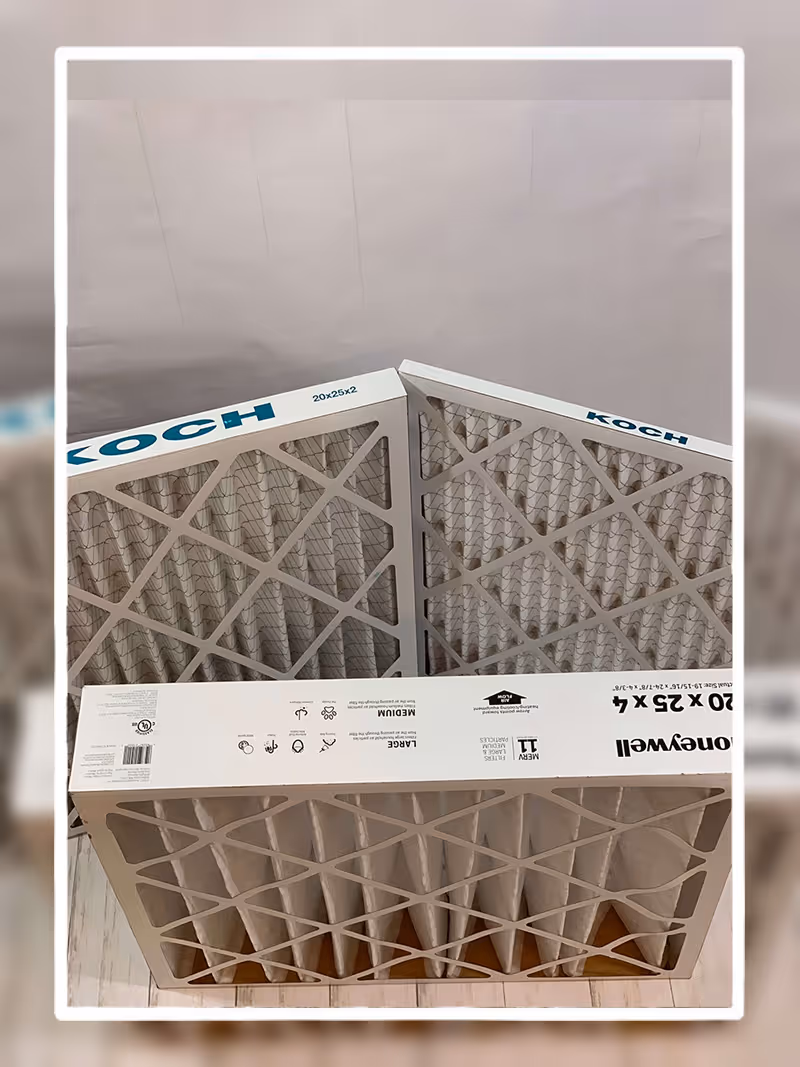 Three KOCH air filters stacked on each other with geometric pattern