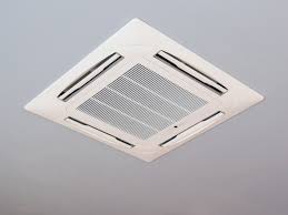White square ceiling-mounted air conditioning unit with vent grille