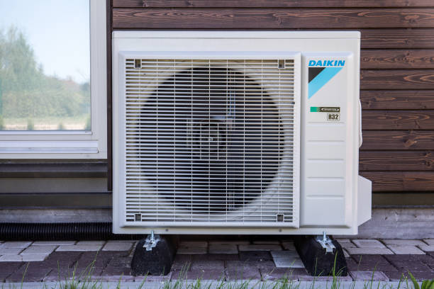 Daikin heat pump unit installed outside a home.