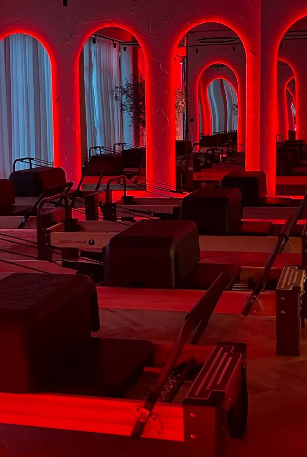 a room with red columns and red lights