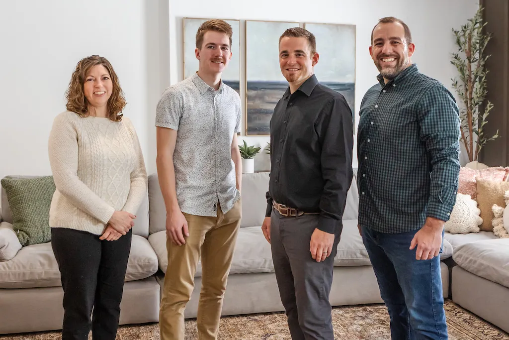 Our church leadership standing together in a cozy living room. 