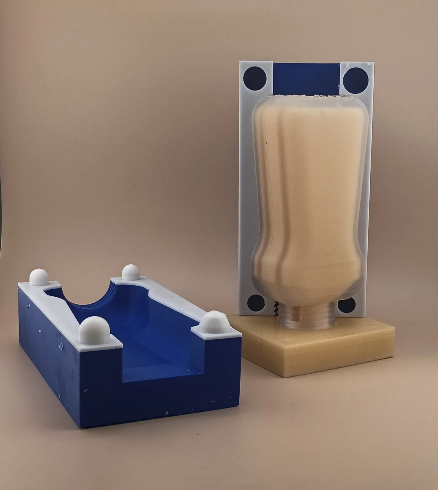 Silicone mould halves and a cast bottle body used to produce the ALDI Bramwells prototypes