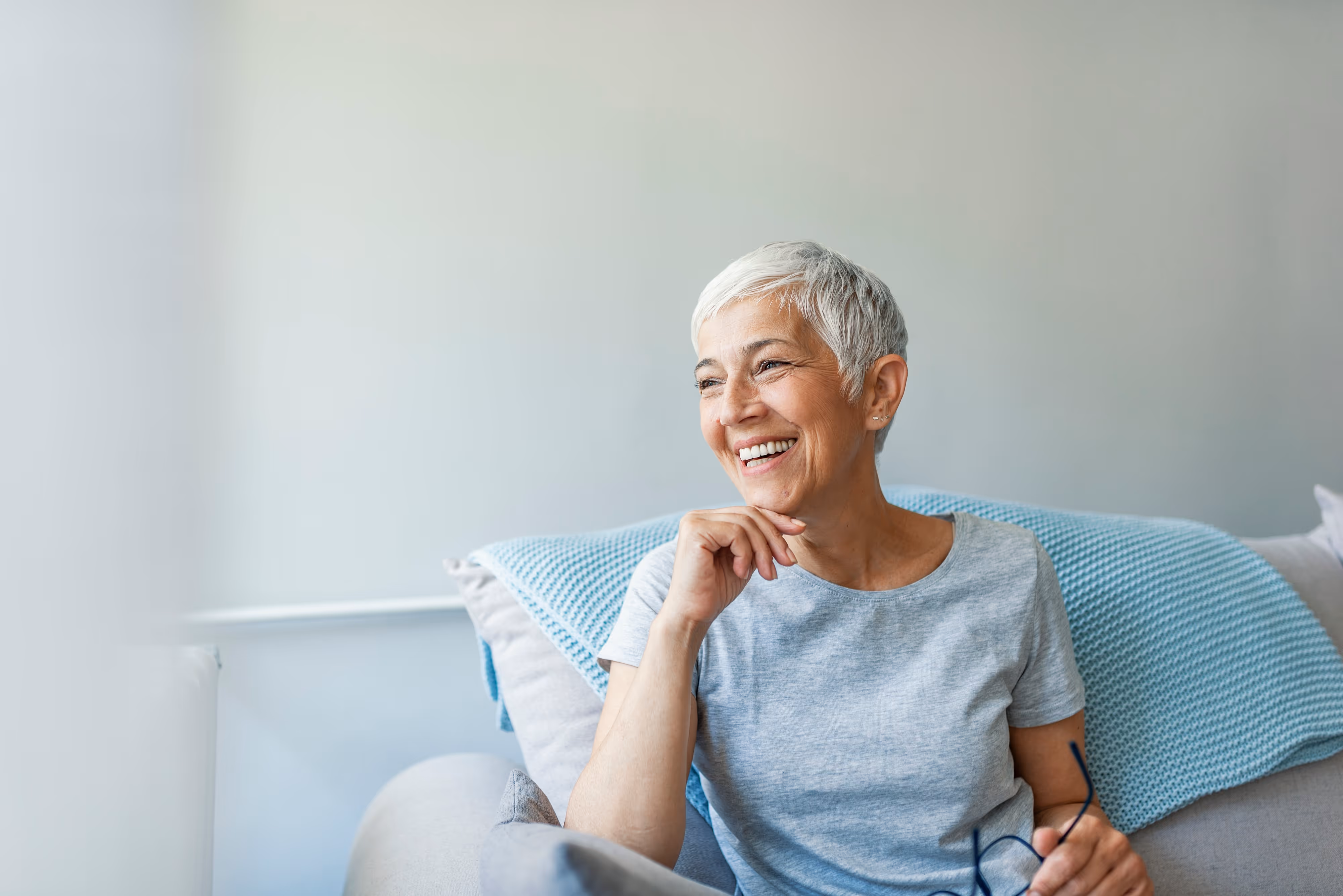 Sitting and Smiling Stock Photo