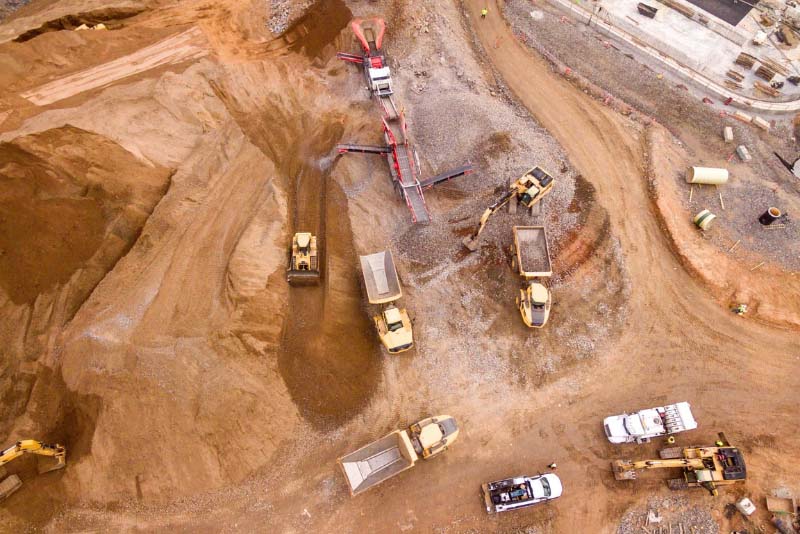 stock photo trucks at mining site