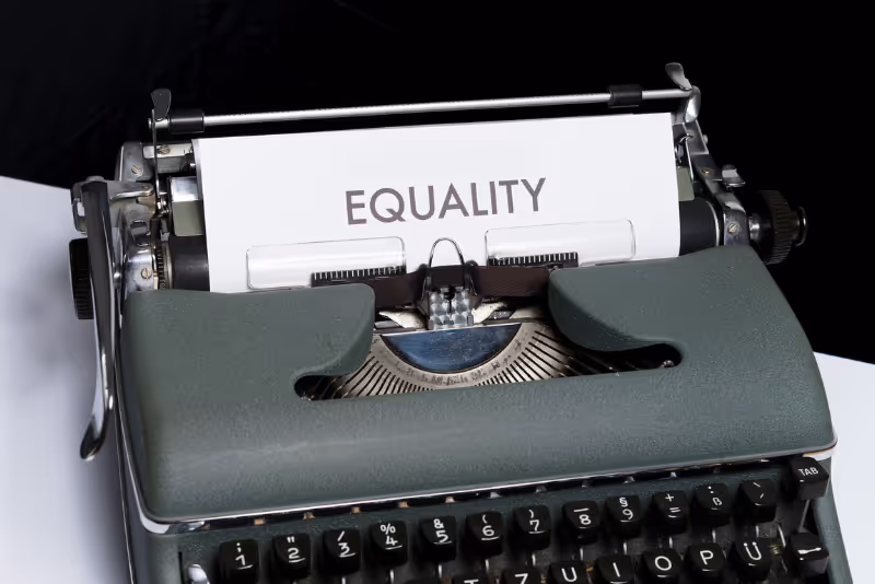 stock photo typewriter with equality typed on paper