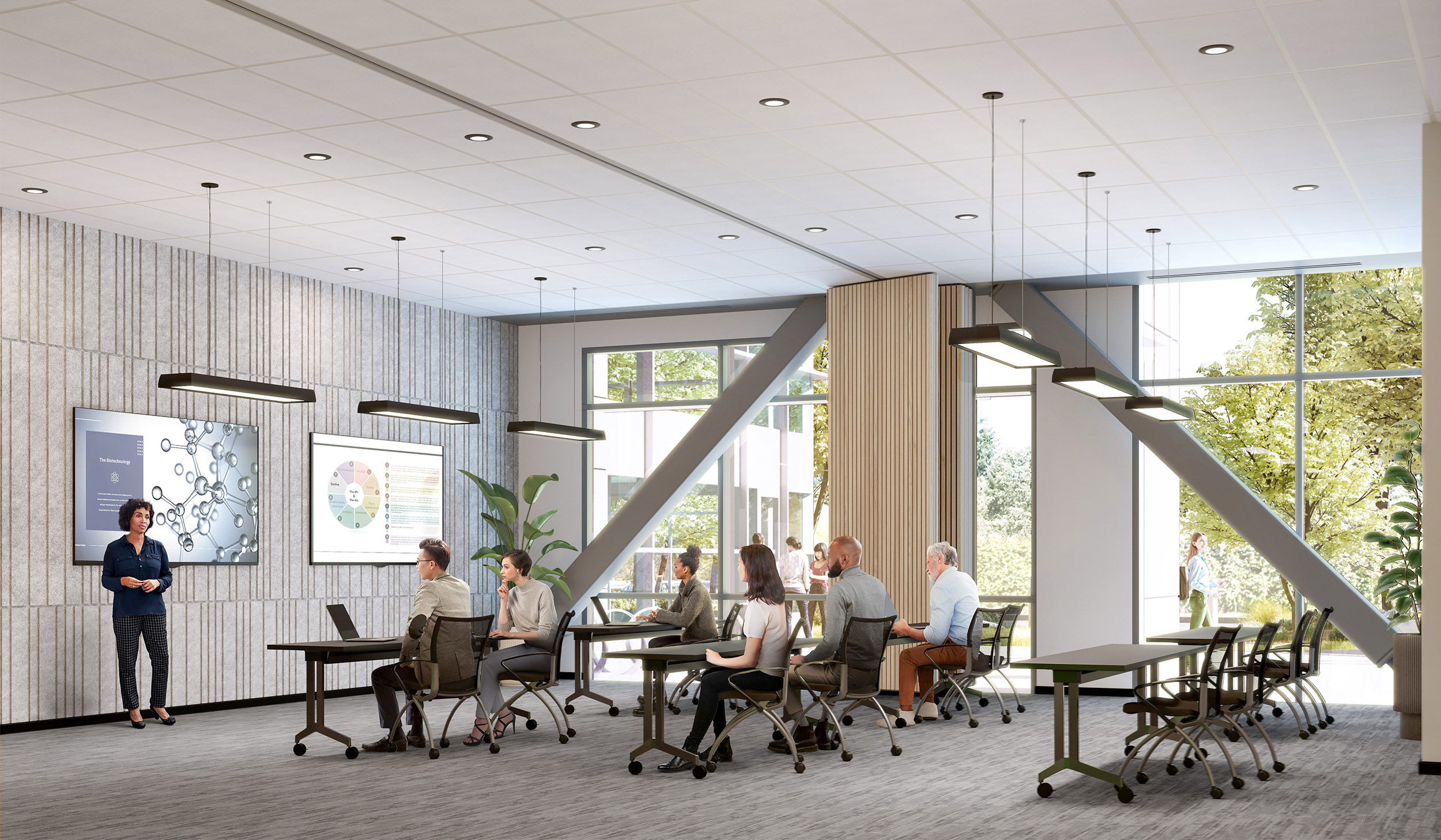 Colleagues paying attention to a slideshow presentation in a workplace classroom setting