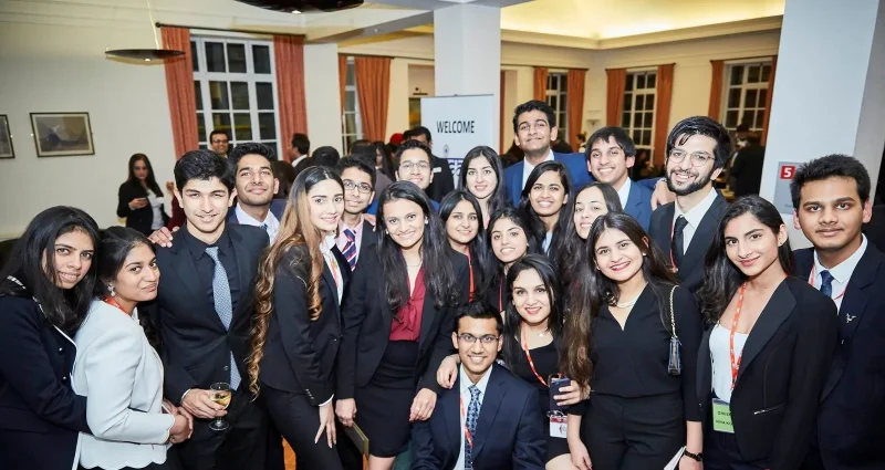 Photo of alumni networking/meeting