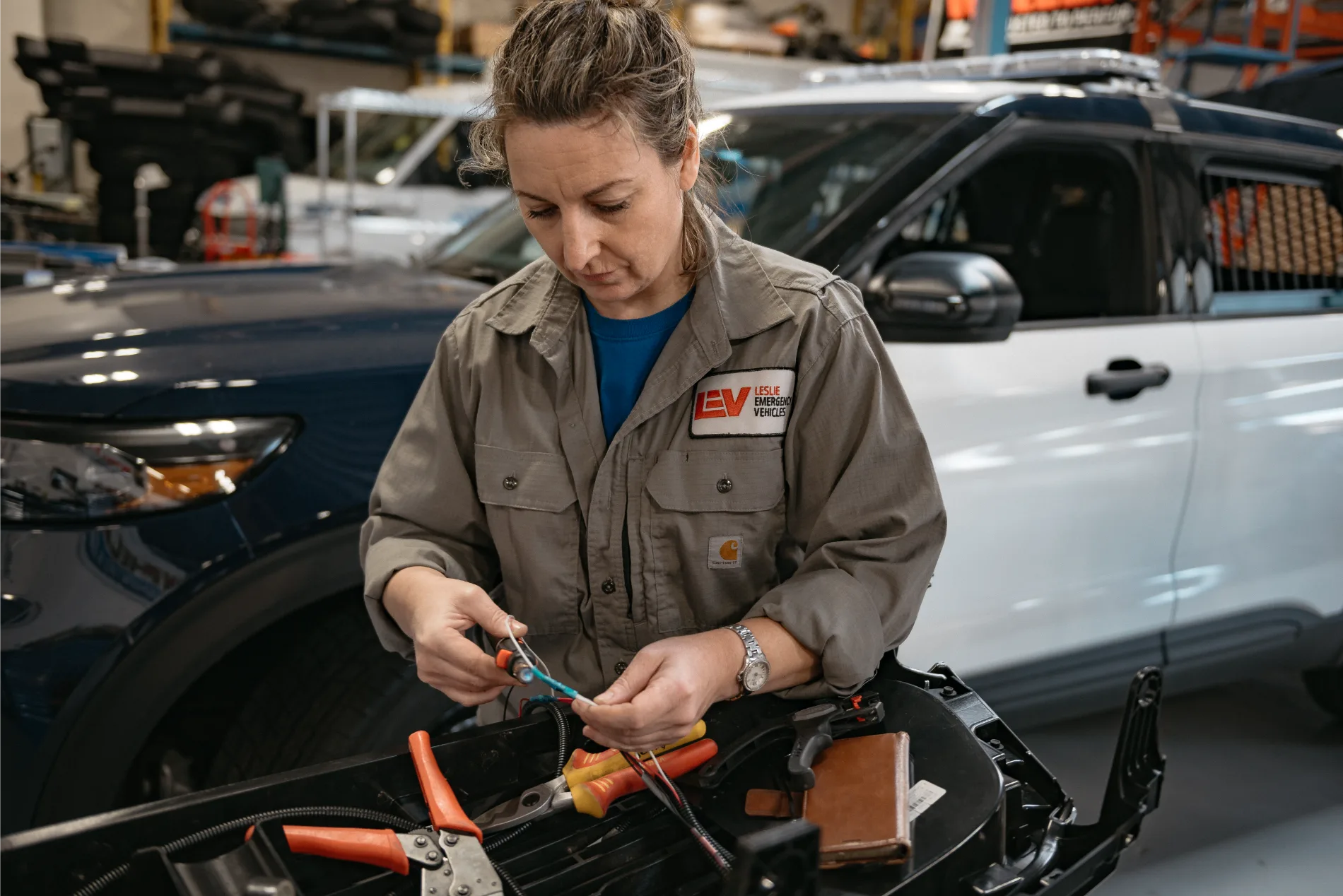 1 LEV Technician Installing a new technology into an emergency vehicle.