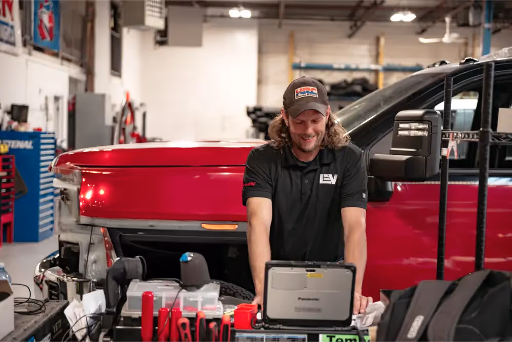 1 LEV Technician Installing a new technology into an emergency vehicle.