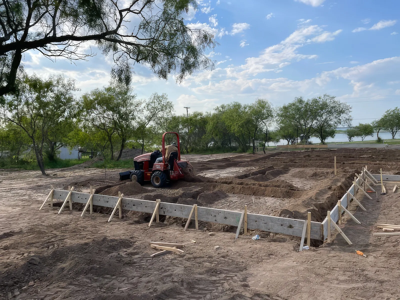 breaking ground at project site