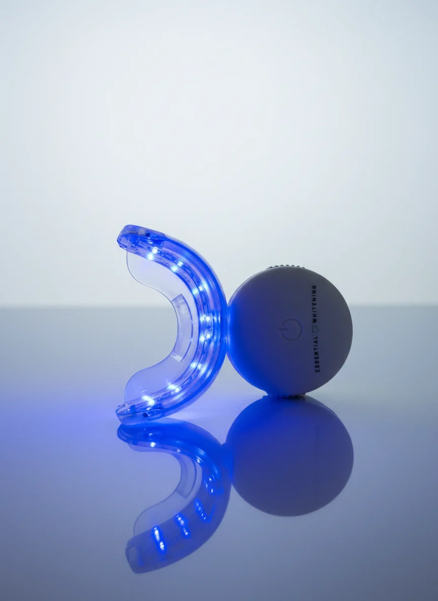 Essential Whitening mouthpiece illuminated with blue LED light