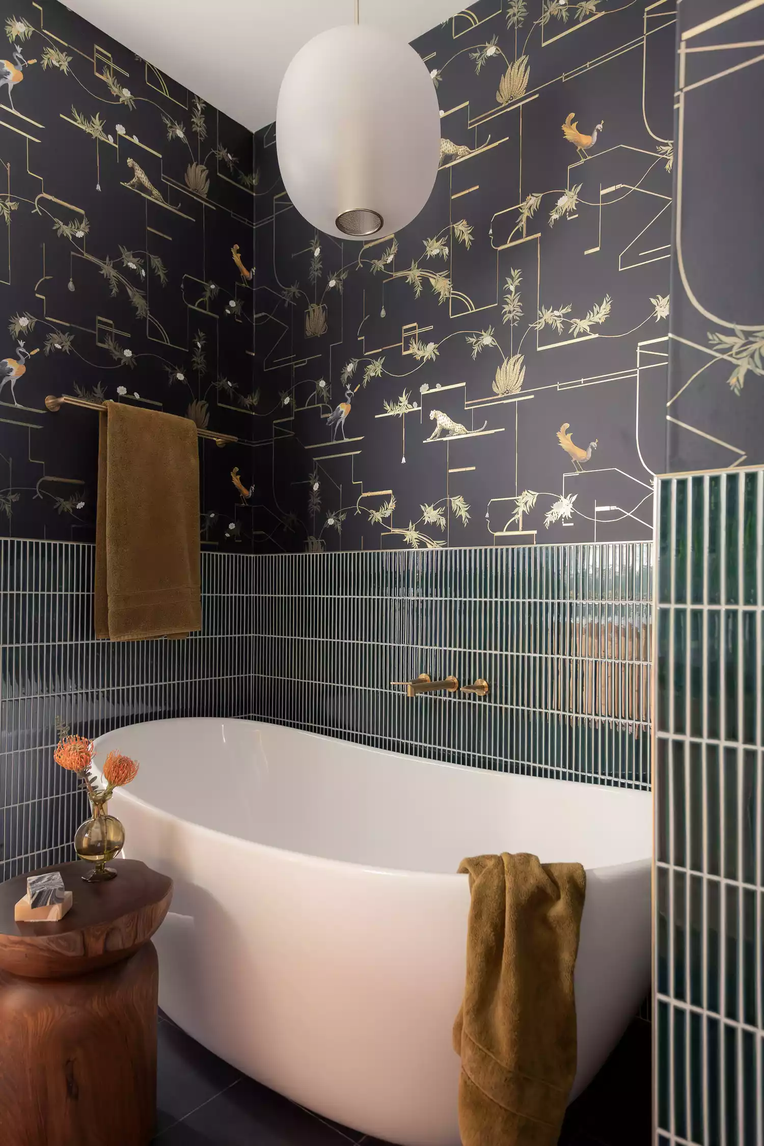 Black bathroom with wallpaper