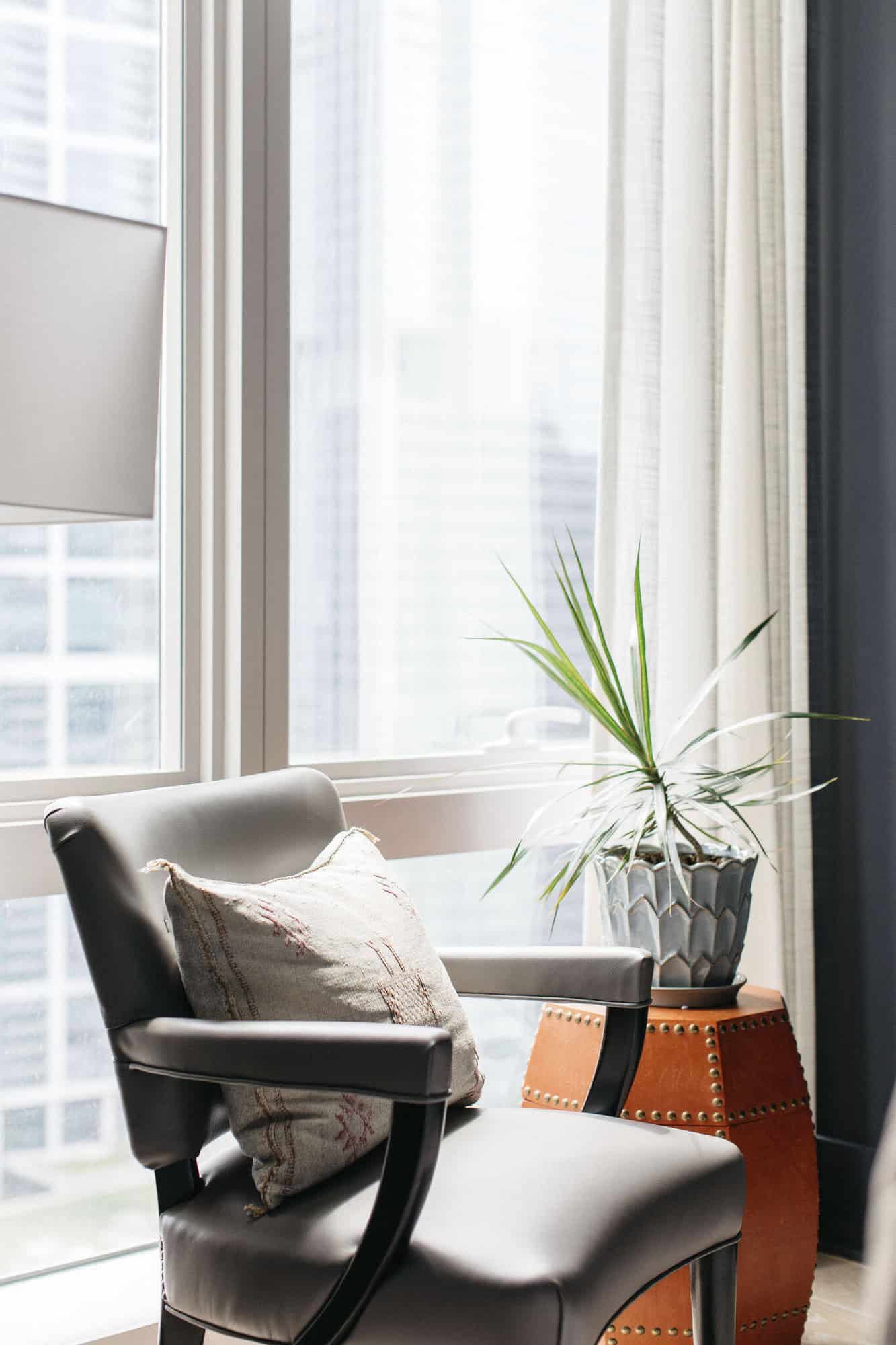 contemporary-family-room-chair-and-table-in-the-window