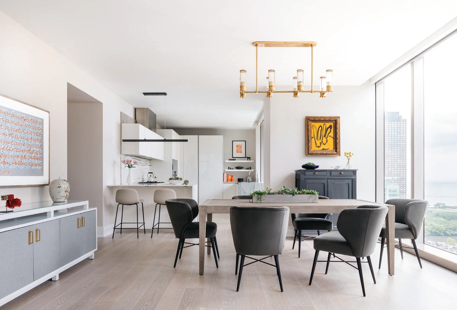 Artworks (from left ) by Yaacov Agam, Donald Sultan and Hunt Slonem hang in the kitchen and dining room PHOTOGRAPHED BY MARGARET RAJIC