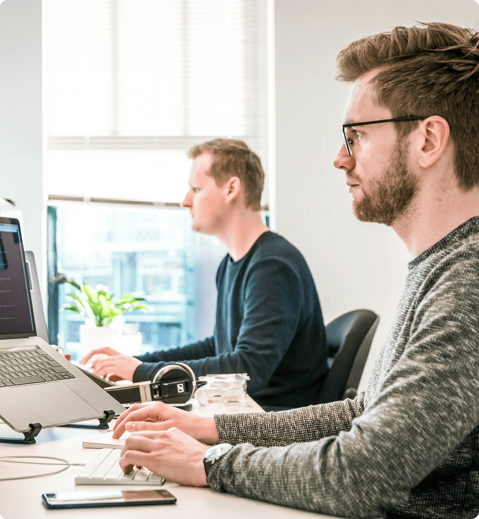 Trustsoft engineers working together in the office