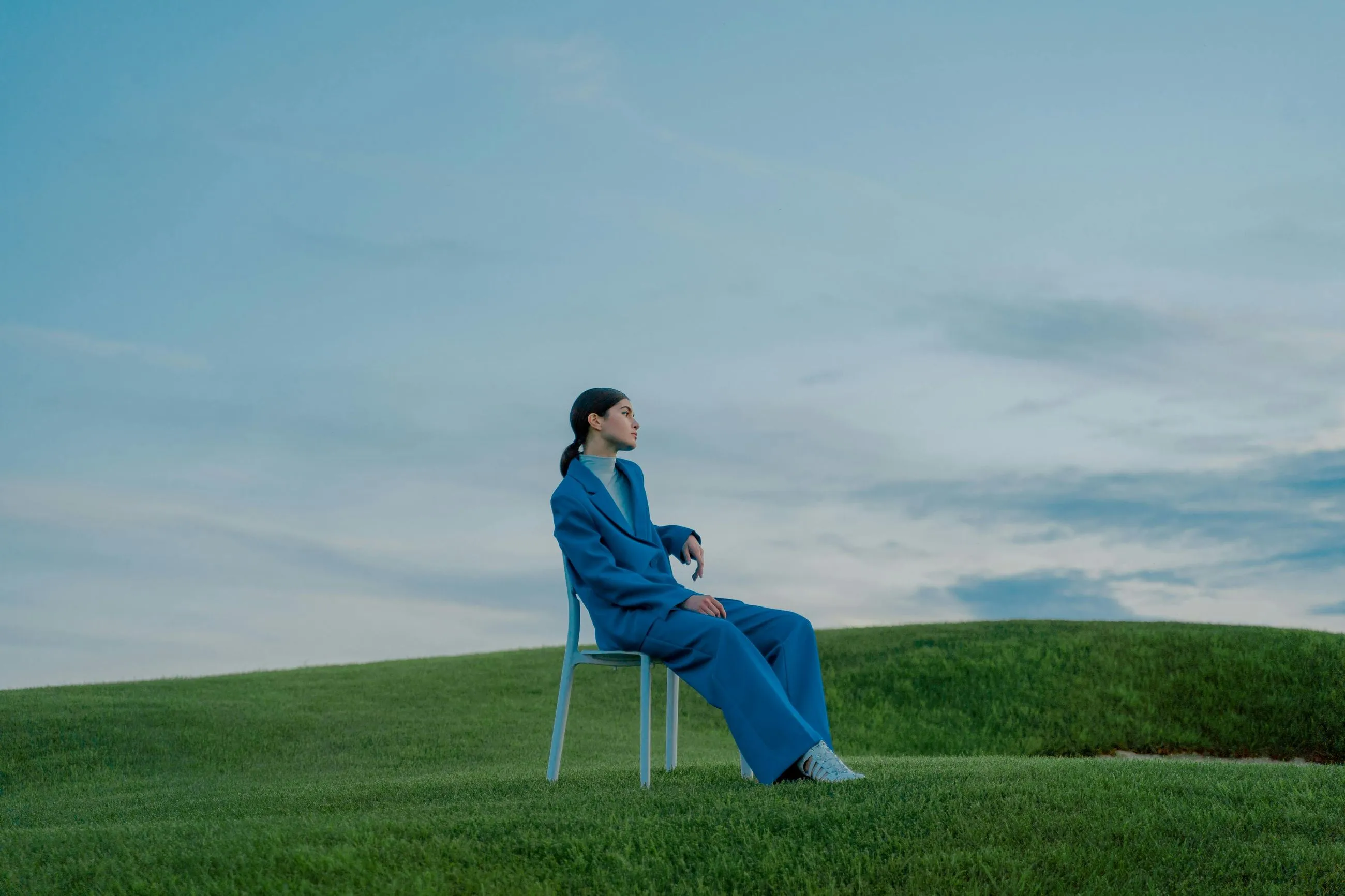 Woman on Blue Sit in the Chair