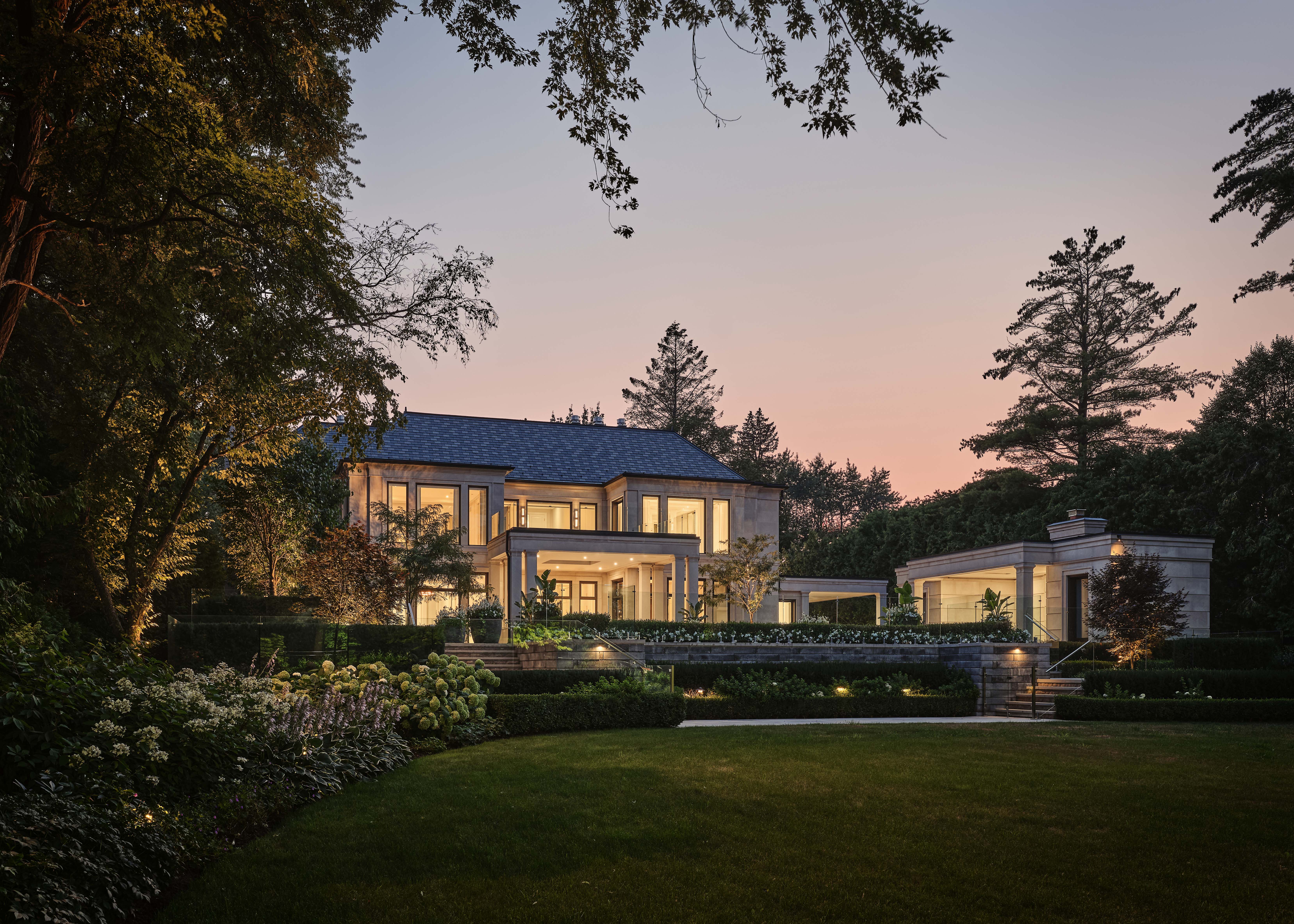 The entrance to the Bedford, with cars entering the car park.