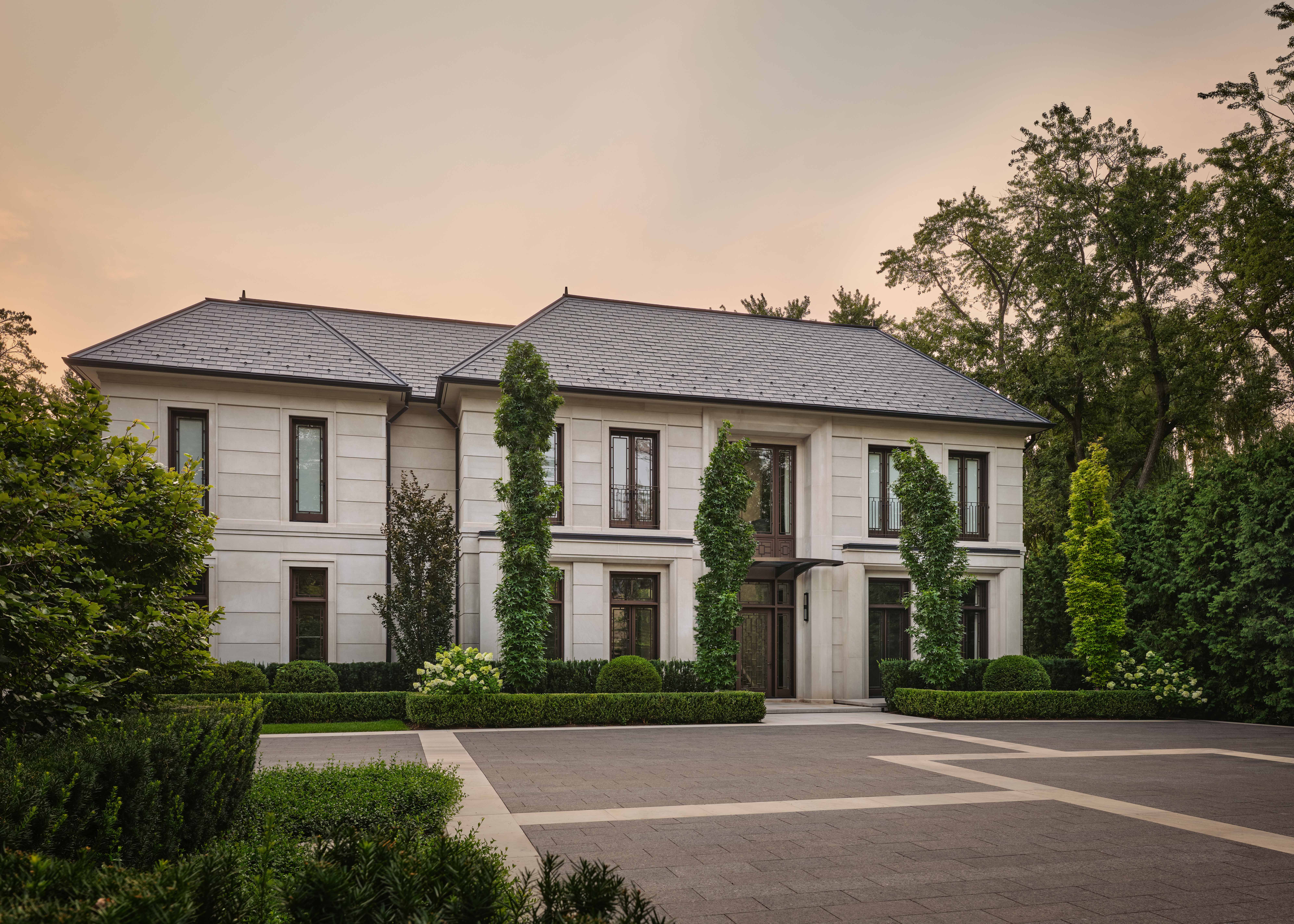 The entrance to the Bedford, with cars entering the car park.