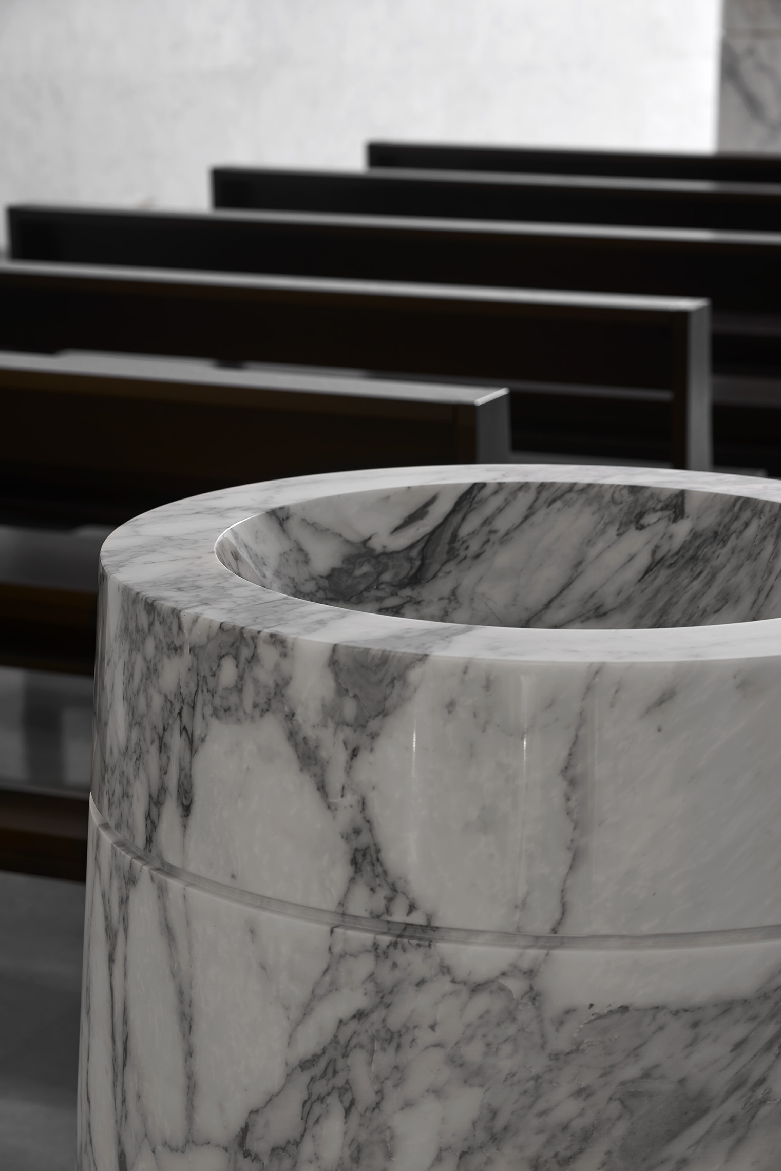 101 Spadina's rooftop balcony with a large arch framing the skyline.