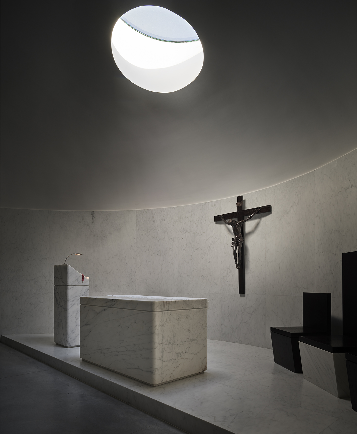 101 Spadina's rooftop balcony with a large arch framing the skyline.