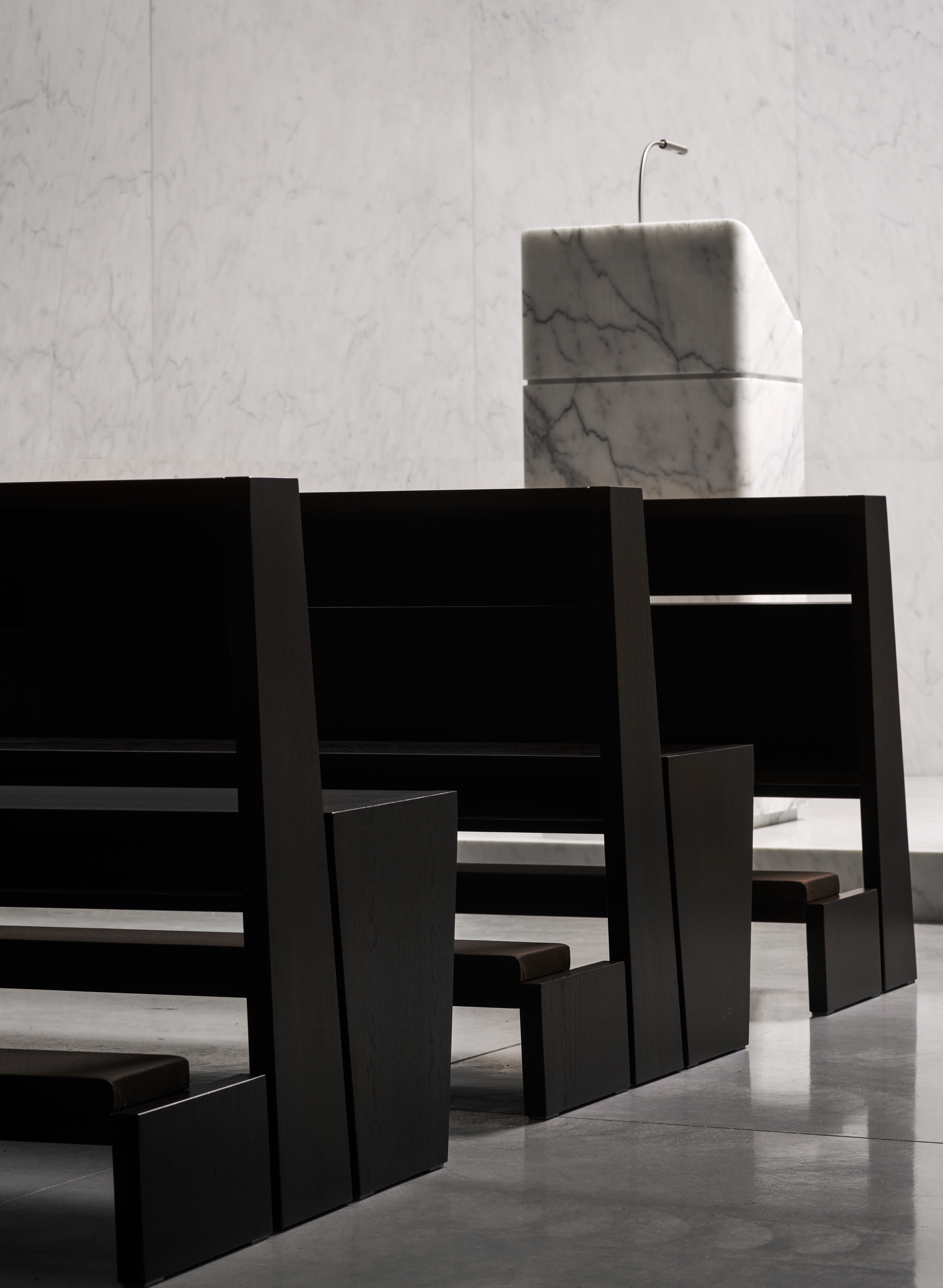 101 Spadina's rooftop balcony with a large arch framing the skyline.