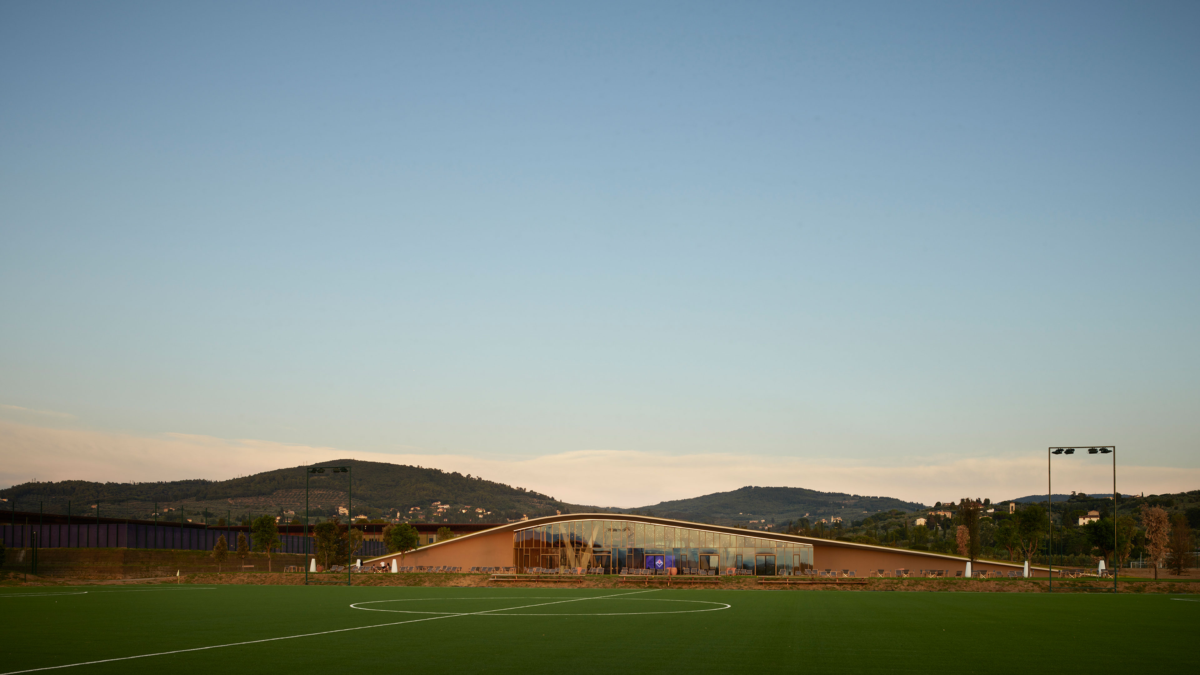 101 Spadina's rooftop balcony with a large arch framing the skyline.