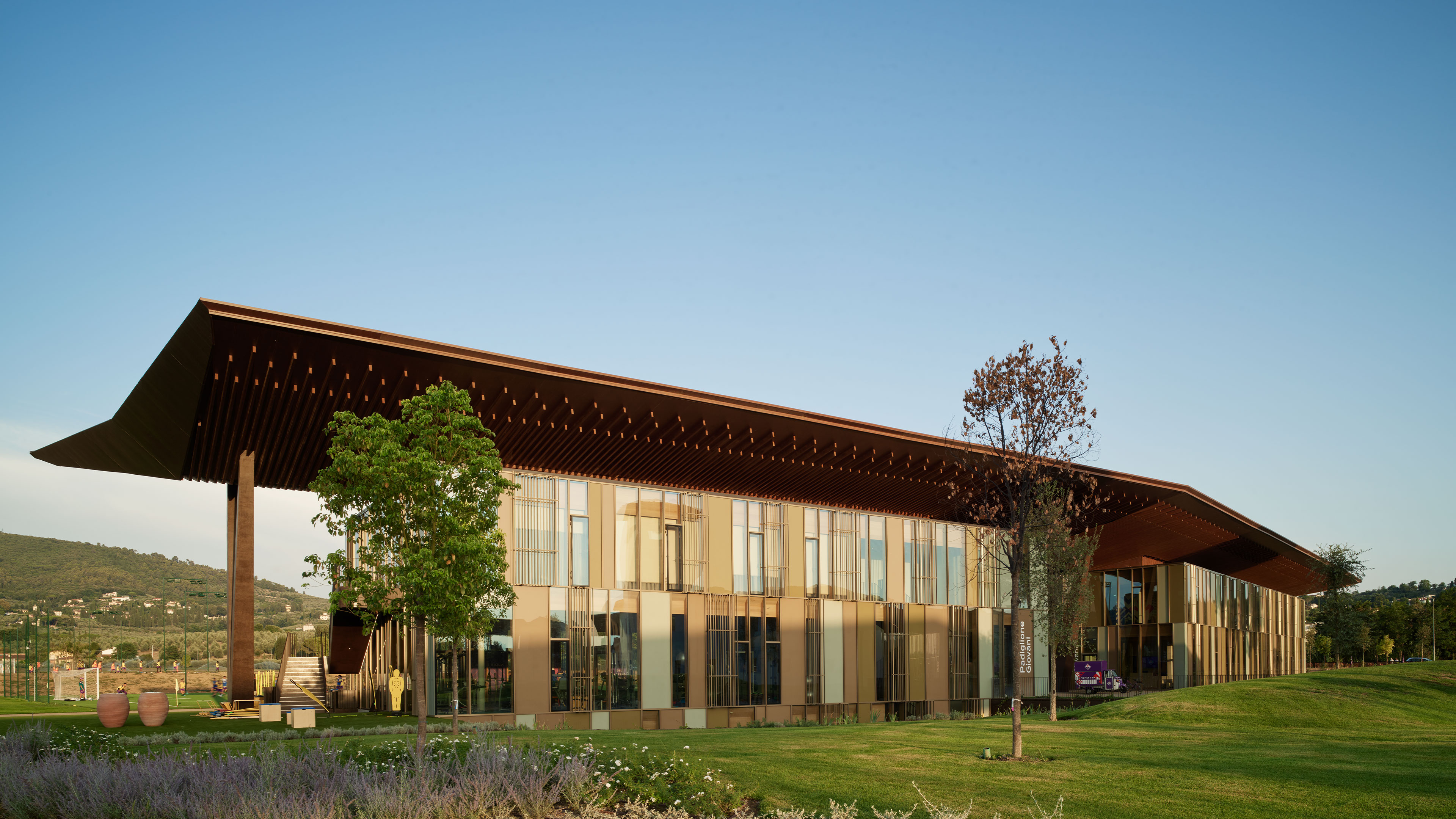 communal space in 101 Spadina with green chairs.