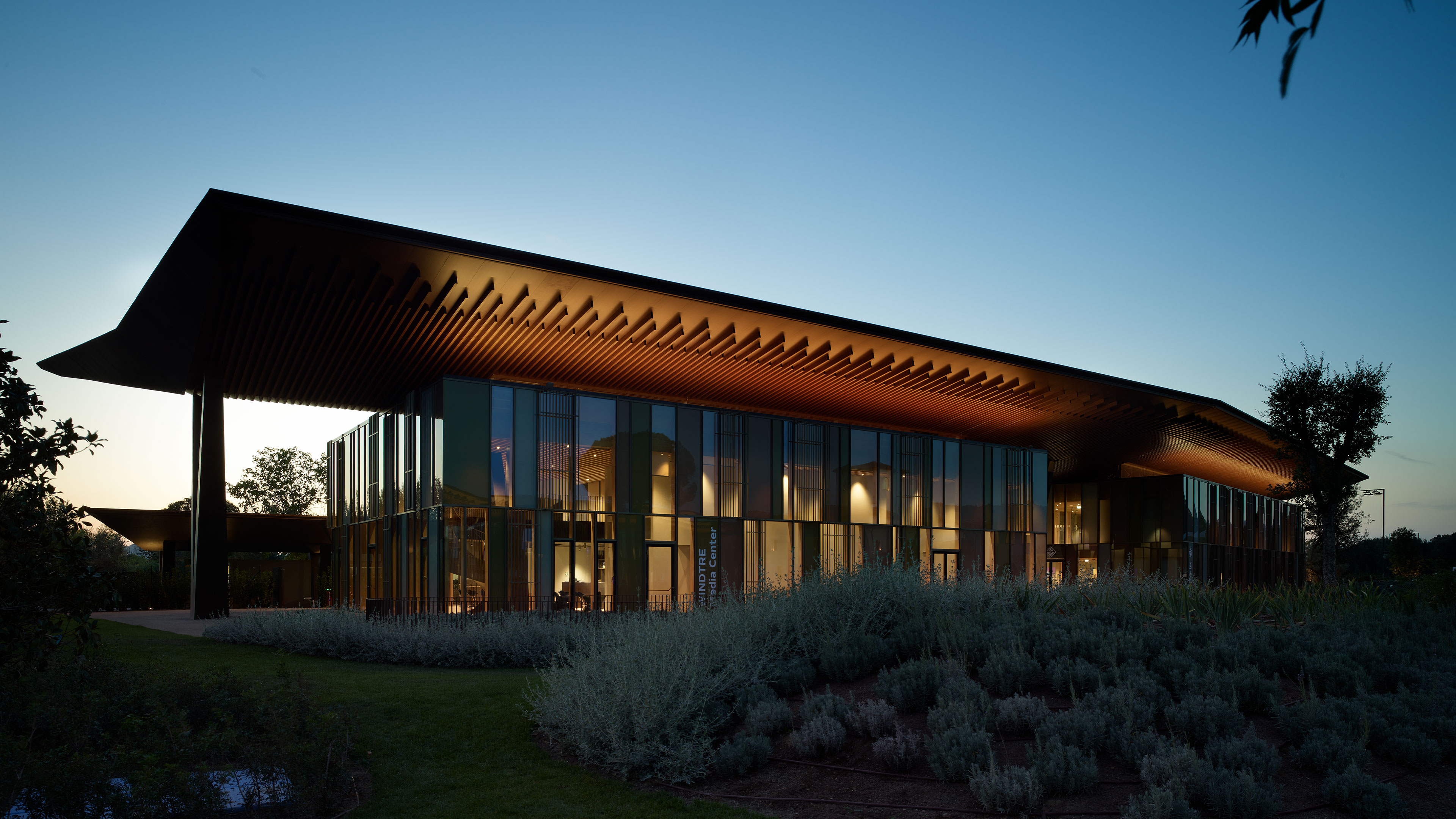101 Spadina's rooftop balcony with a large arch framing the skyline.