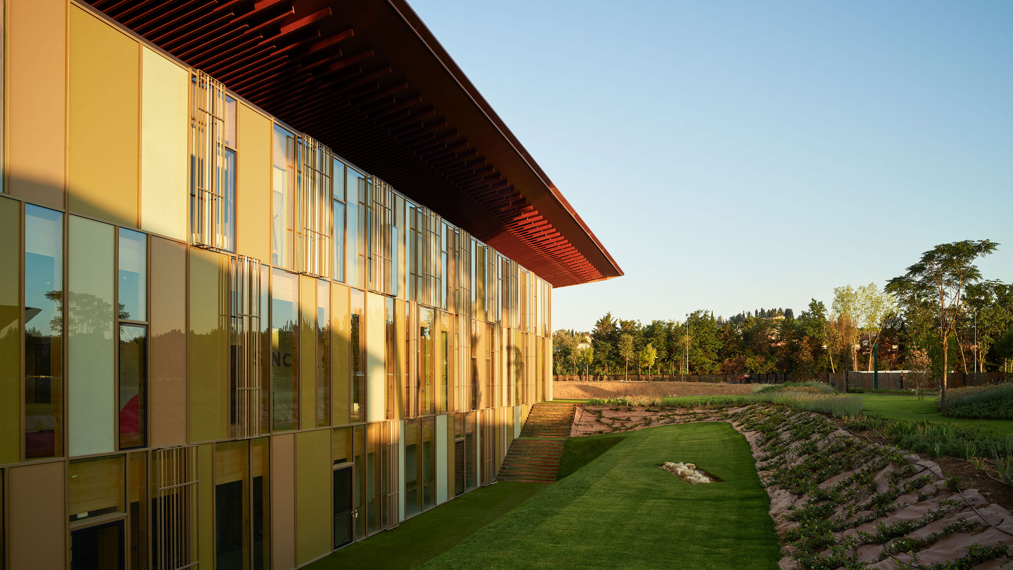 101 Spadina's rooftop balcony with a large arch framing the skyline.