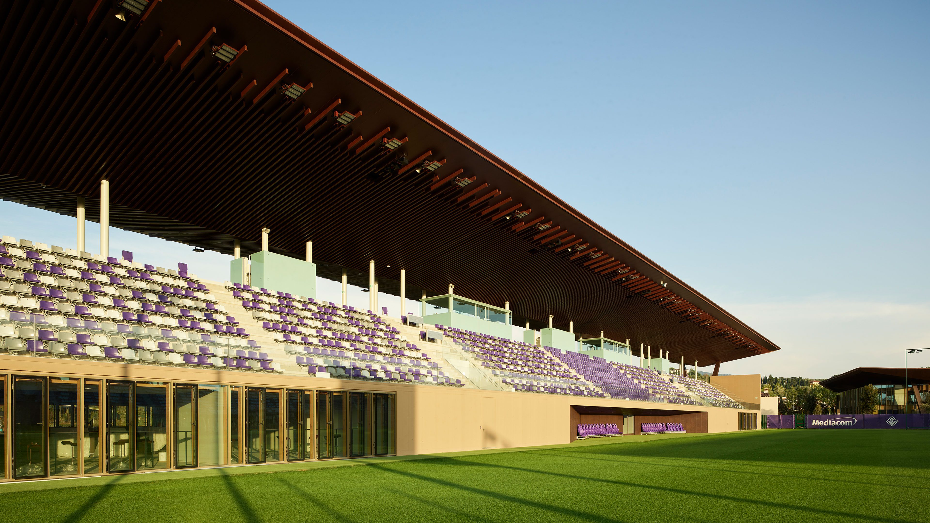 101 Spadina's rooftop balcony with a large arch framing the skyline.