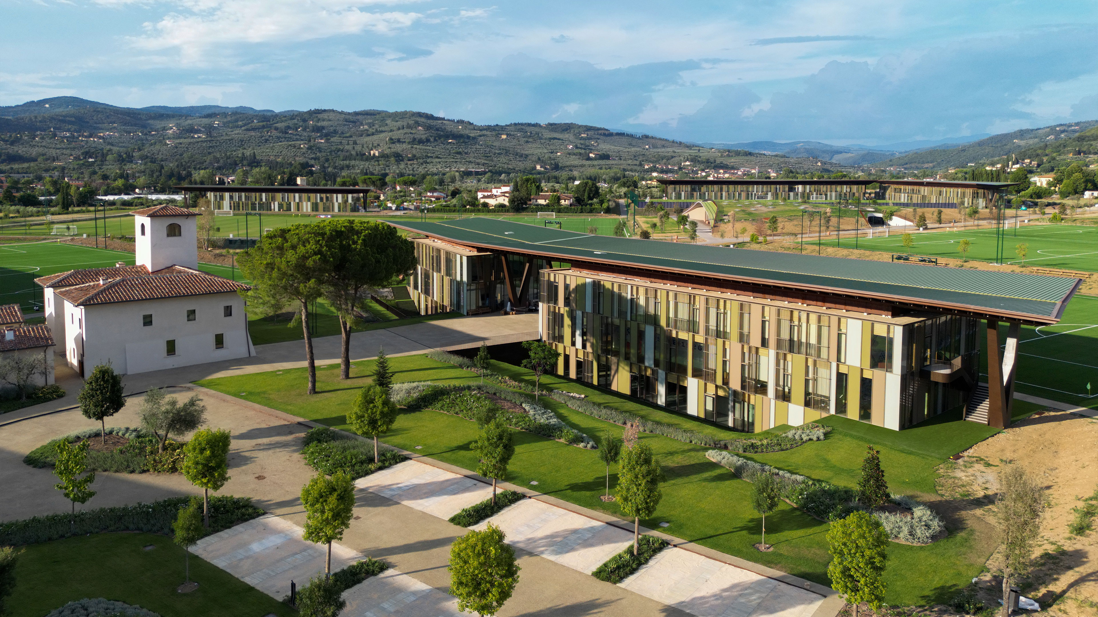 Woman sitting in front of 101 Spadina's entrance.