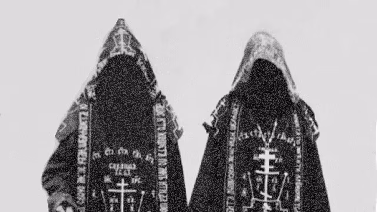 Two Monks in black robes. Thumbnail The Mystery of the Eastern Orthodox Church.