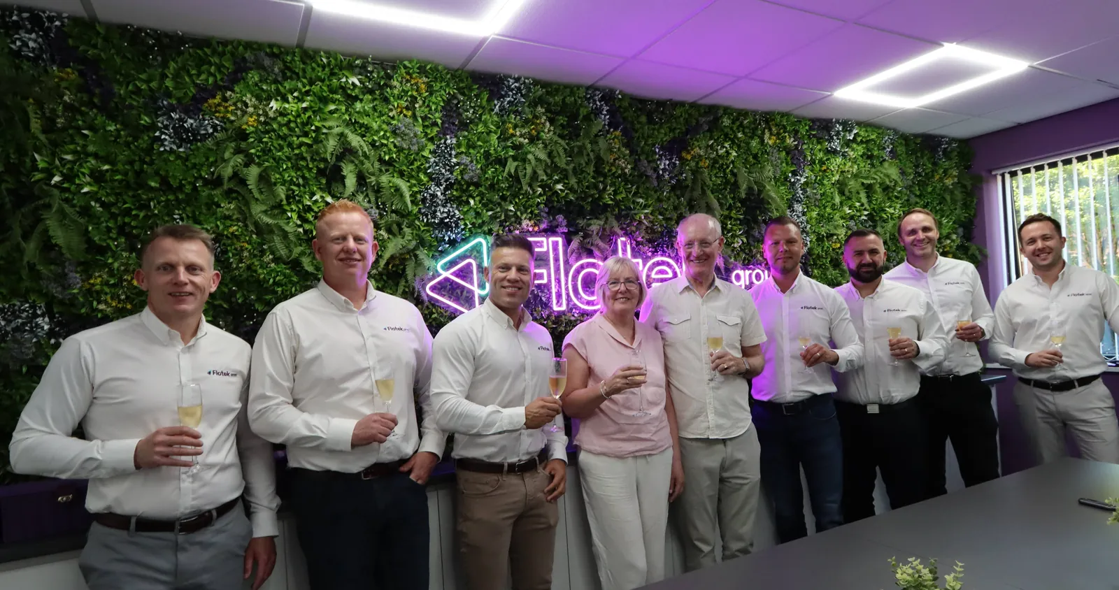 Flotek Group board of directors with Clear Telecom co-owners Barbara and John Malone