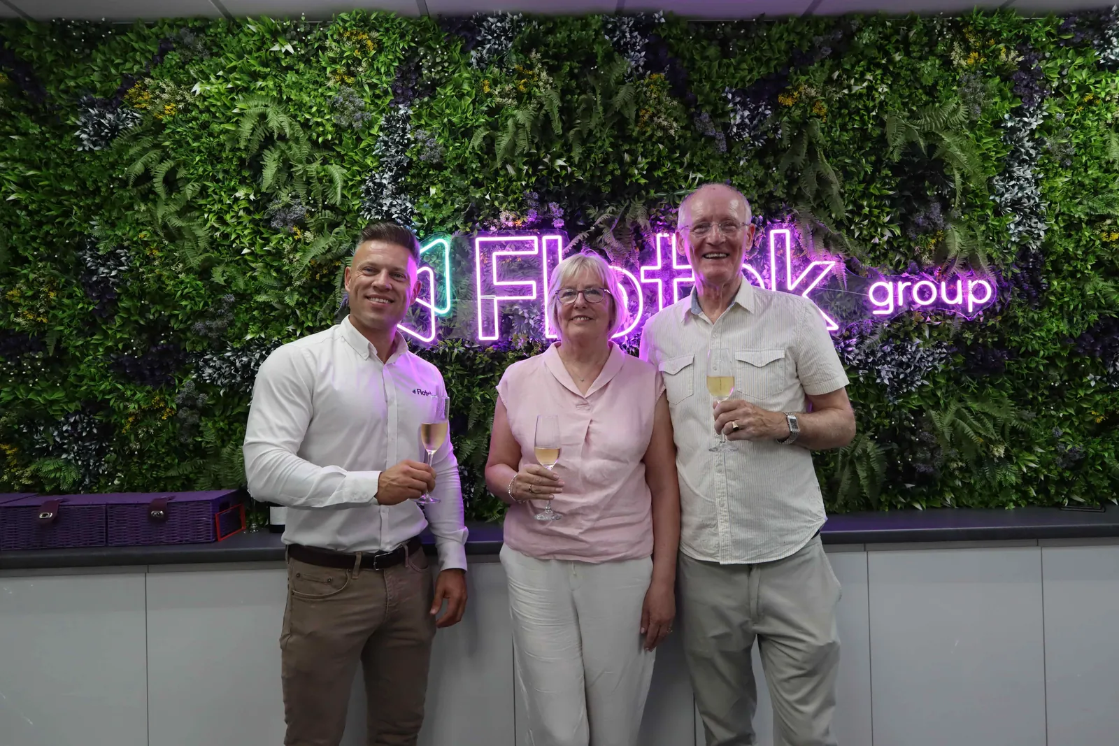 Flotek Group CEO Jay Ball with Clear Telecom co-founders Barbara and John Malone