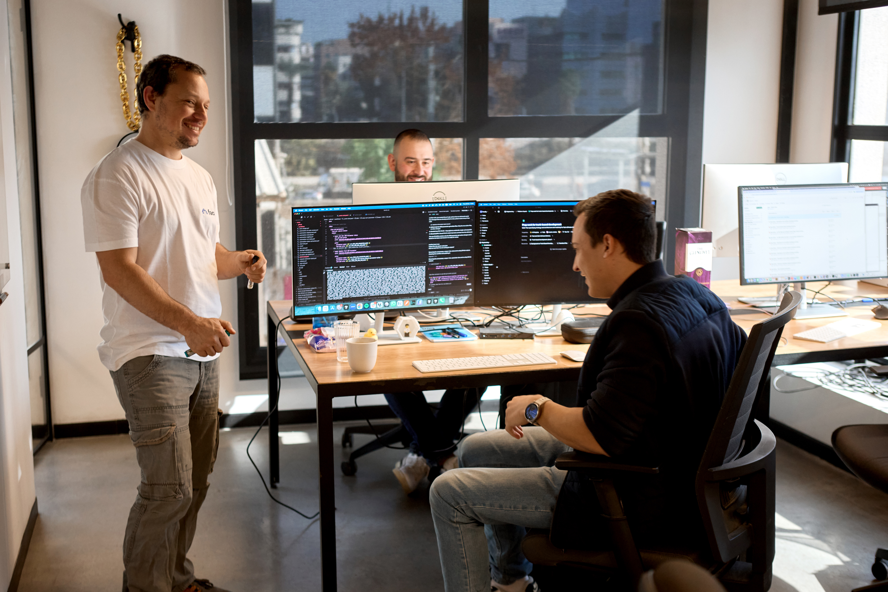 The team working together at their desks