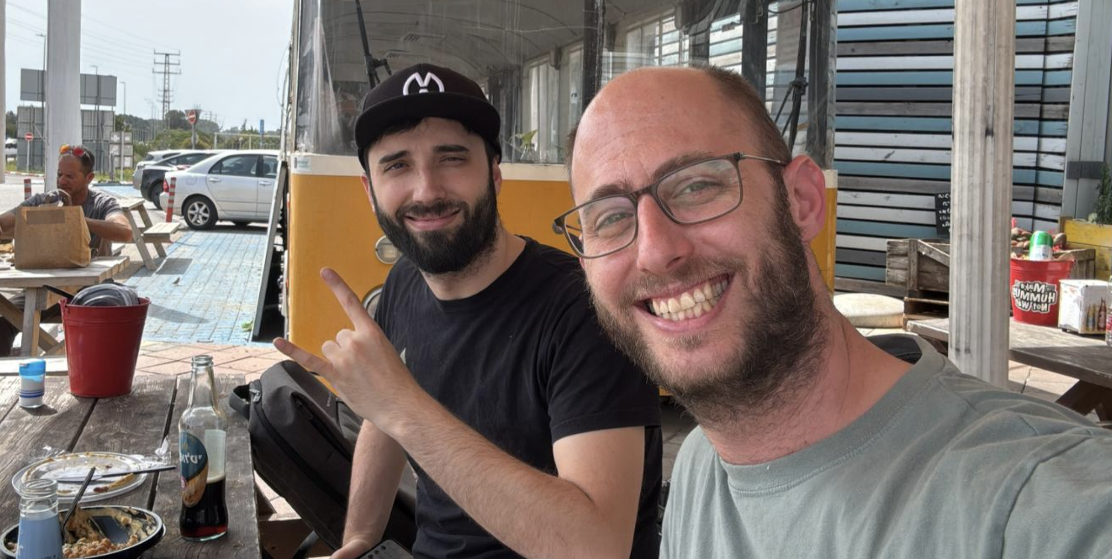 Two teammates at a food truck