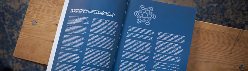 DK Company A/S – årsrapport med magasin-layout, designet af KATAPULT