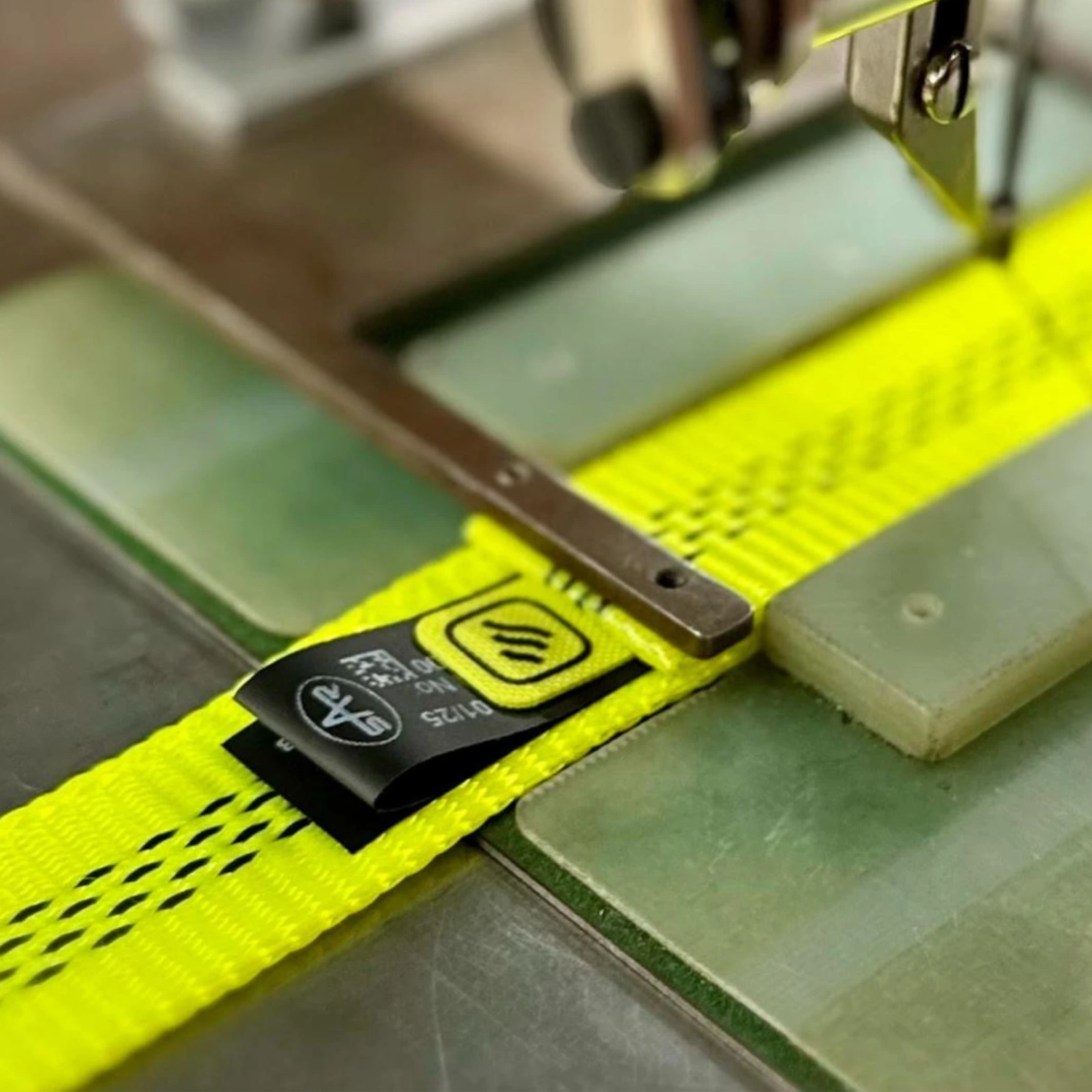 Safety equipment manufacturing, sewing in NFC tag